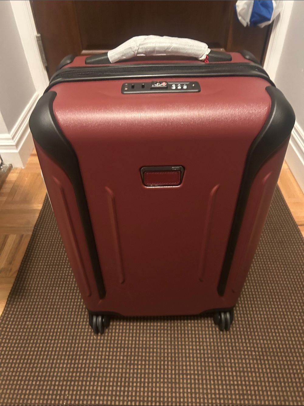 Tumi Maroon International Carry-On Luggage